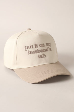 Put It On My Husband's Tab Beige Embroidered Trucker Hat