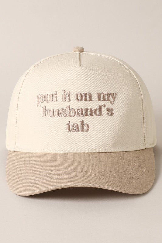 Put It On My Husband's Tab Beige Embroidered Trucker Hat