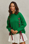 Holly Jolly Lace Up Bow Tie Sweater