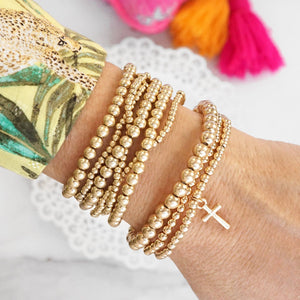 Gilded Grace Gold Cross Charm Stretchy Bracelet Set