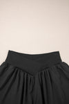 Twist & Tier Black Crossed Waist Flowy Shorts