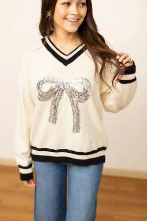 Wrap It With A Bow Silver Sequin Bow Varsity Sweater